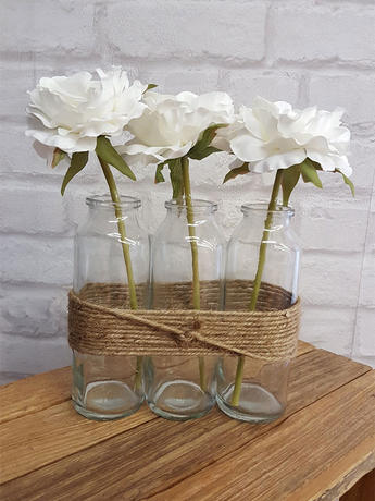 Location-decoration-salle-table-Composition-Vase-Fleurs-tubes